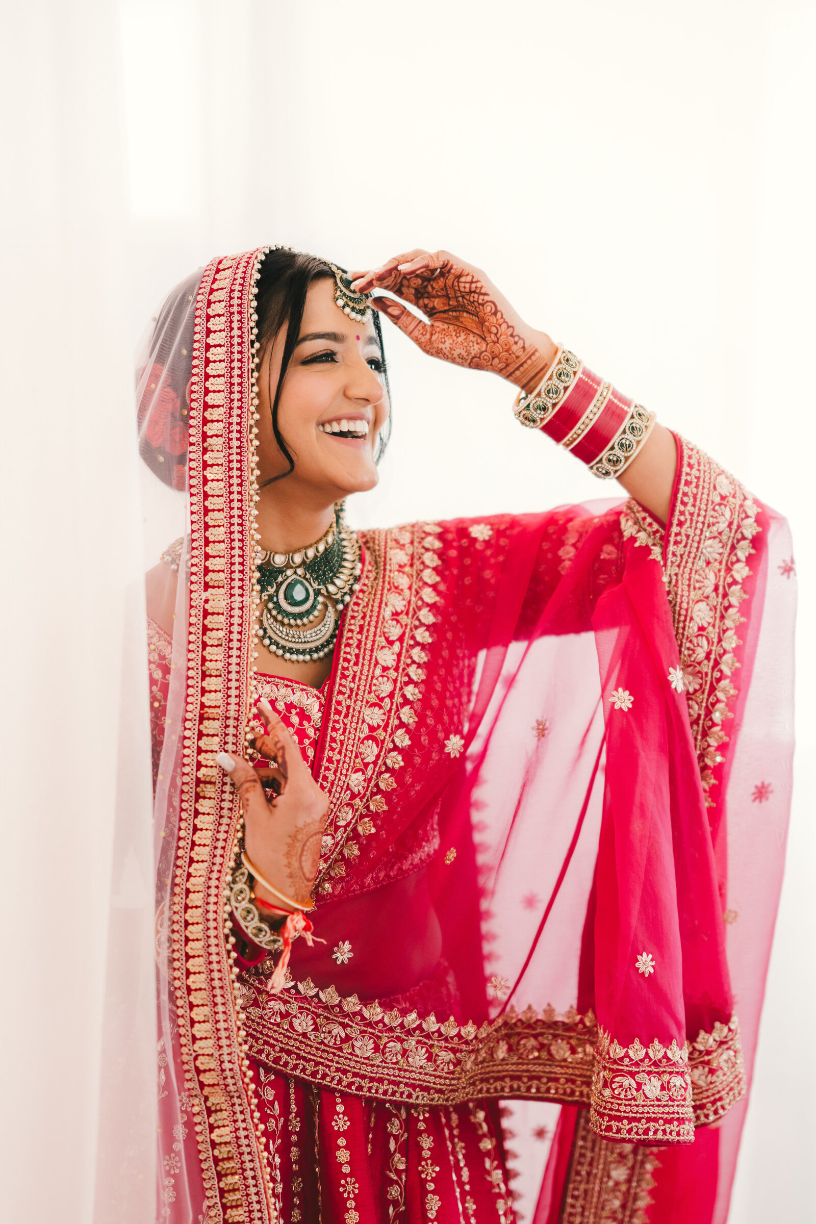 A couple photographed in a considered editorial portrait after their wedding ceremony